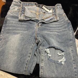 Distressed Blue Denim Jeans